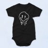 Melted Smiley Face Graphic Baby Onesie